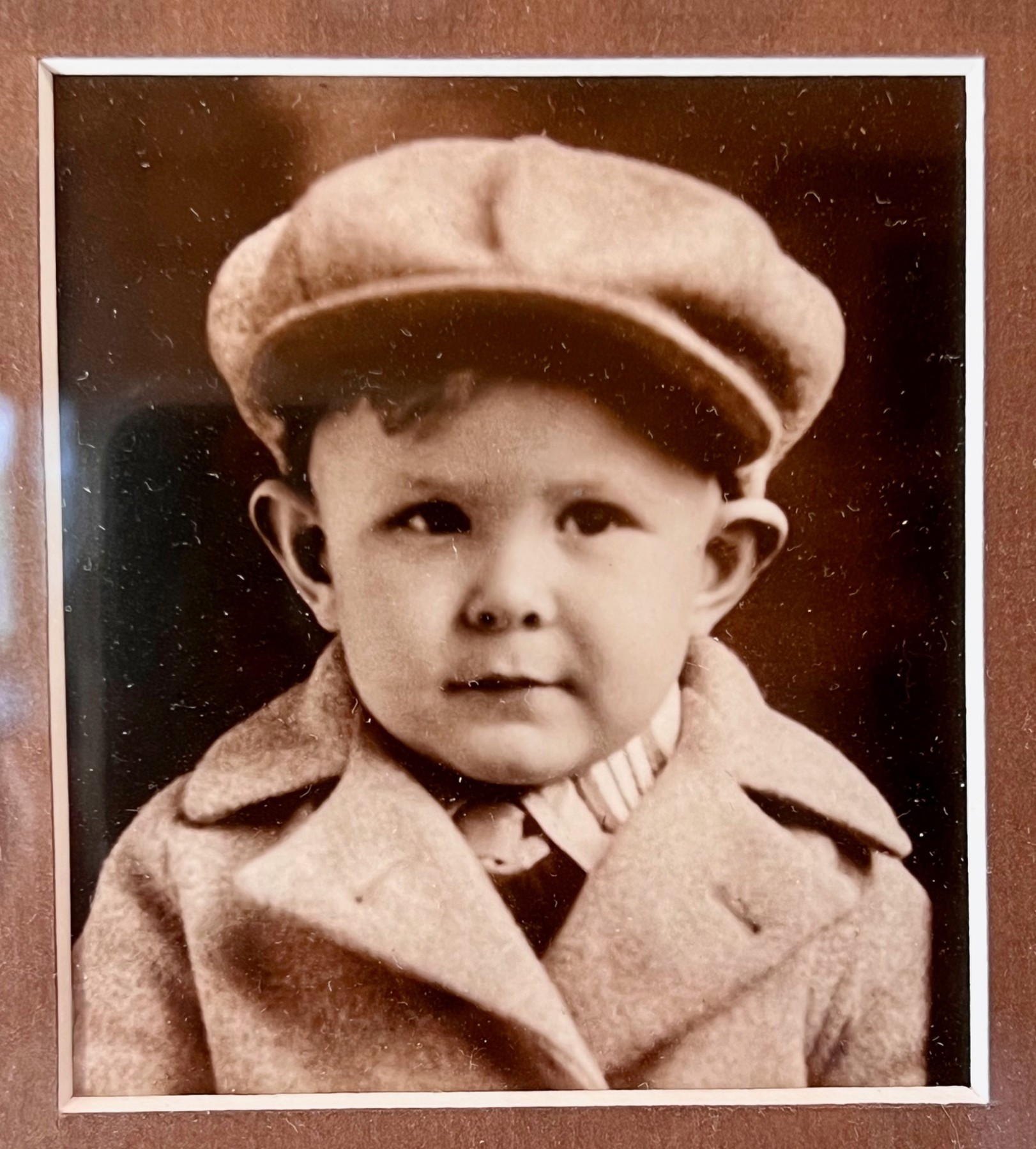 Original childhood photograph of Dad wearing his cap