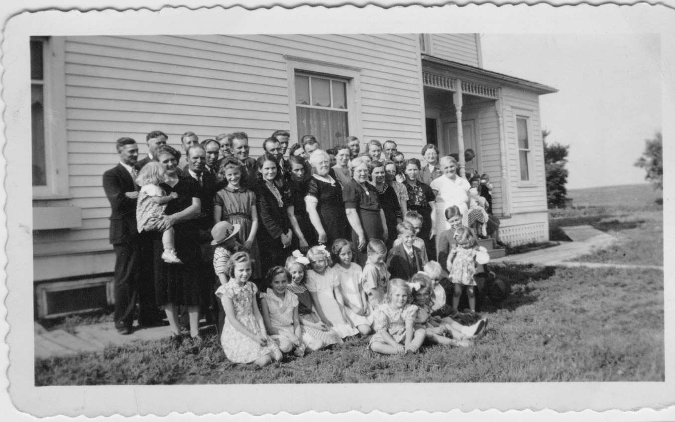Original large black-and-white outdoor family gathering